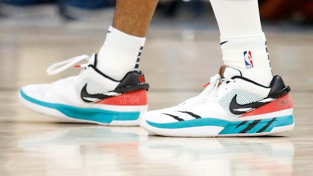 View Ja Morant's white and black Nike shoes.
